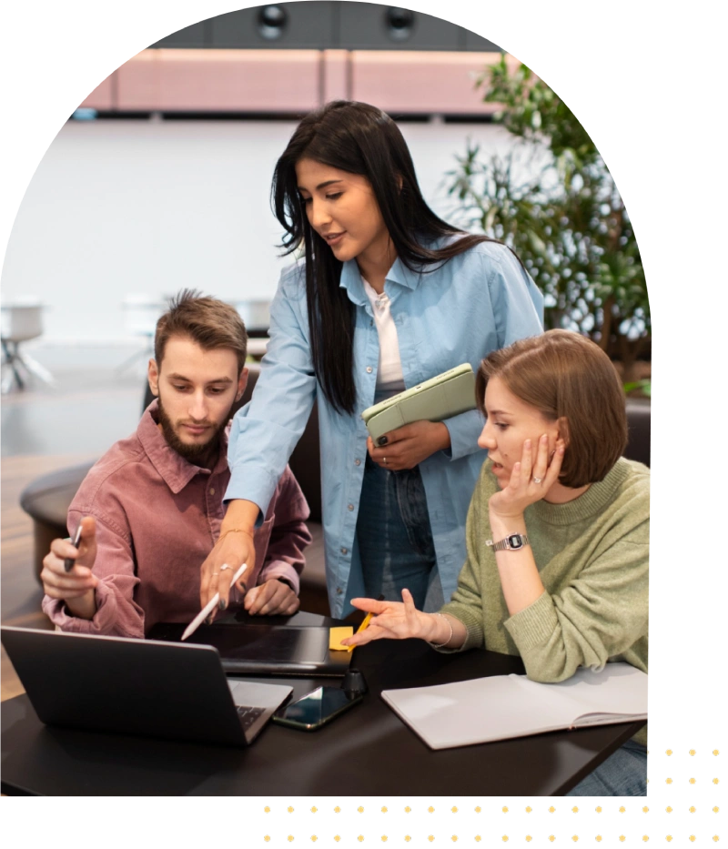 Team of developers collaborating at DevStall, focused on coding and project development.